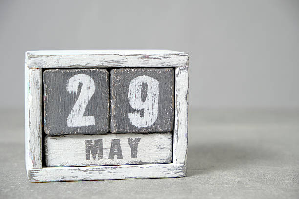 istock May 29 calendar made wooden cubes gray background.With an empty space for your text. 2207472428
