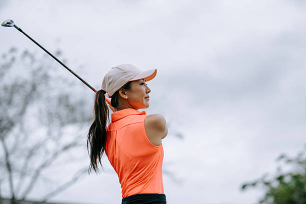 istock Asian Chinese female golfer playing golf in golf course weekend morning 2207474188
