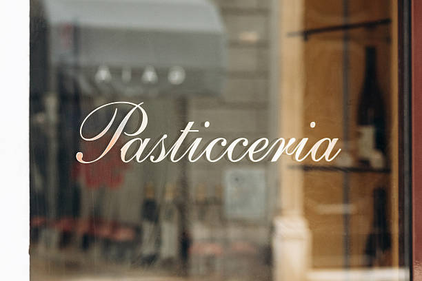 The word Pasticceria (Pastry shop) displayed on the window in Trieste