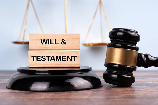istock Judge's gavel and stick with the word WILL AND TESTAMENT. Justice concept 2207475681