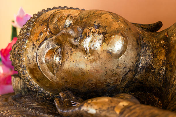 istock The face of the reclining Buddha 2207485065