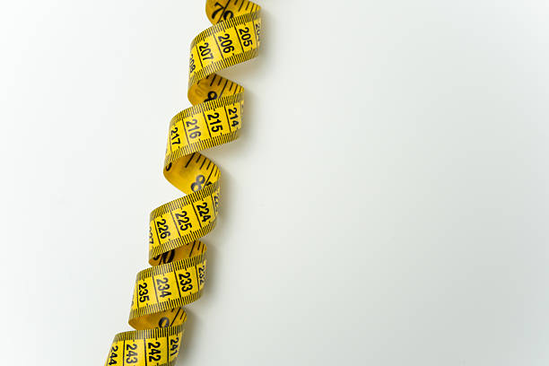 istock Measuring tape isolated on white background 2207485515