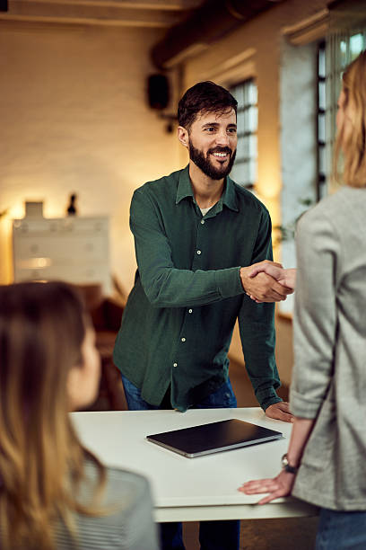 istock Professional Business Meeting Highlighting Agreement and Teamwork in Modern Office Setting 2207486137