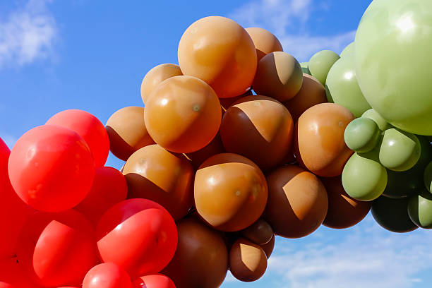 istock diverse and colorful balloons backdrop - birthday party 2207486502