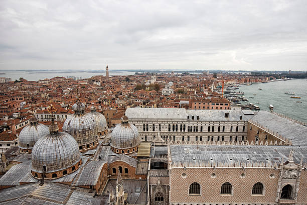 A panoramic aerial view of Venice taken from the tower of San Marco Campanile on a cloudy autumn day.