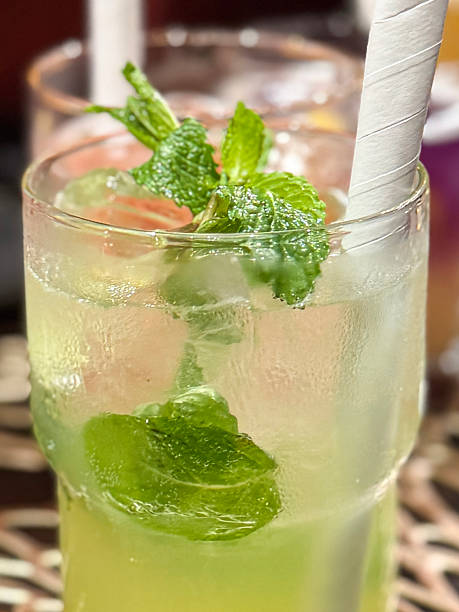 istock Image of refreshing mixed cocktails and mocktails / mojito with mint, ice cubes, lemonade, cool, vibrant drink 2207490983