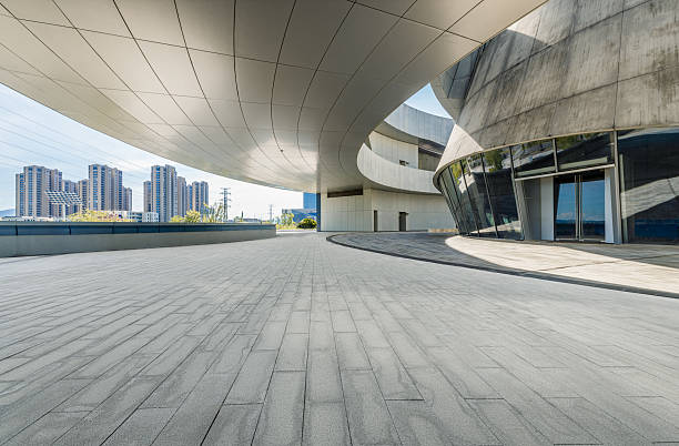 istock Empty modern building with curved roof and brick floor 2207495491