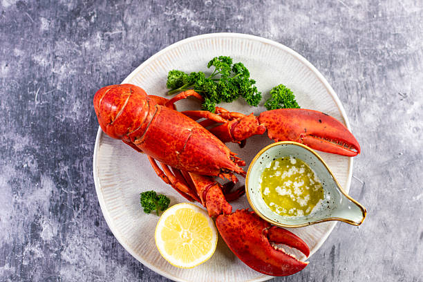 istock Close up of fresh steamed lobster with herbs 2207496603