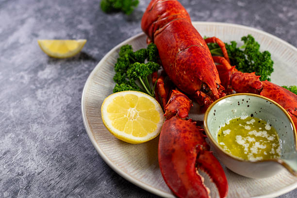 istock Close up of fresh steamed lobster with herbs 2207497931