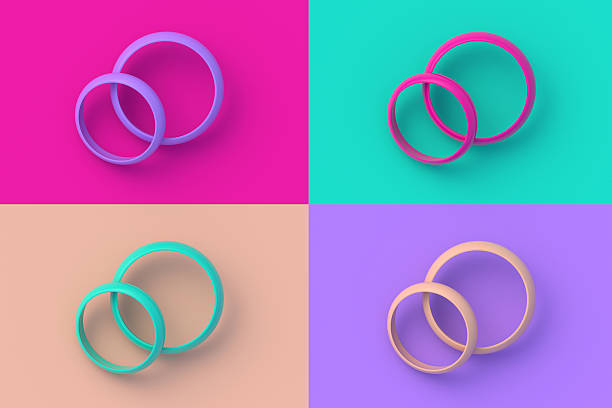 istock Set of four different color wedding rings on colorful segmental background. 3d render 2207500817