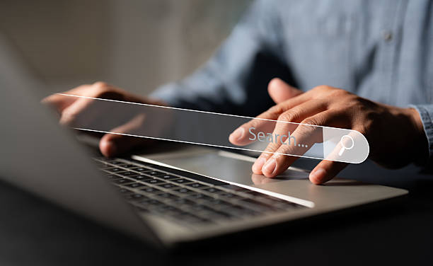 istock A Businessman working with laptop computer device on office desk. Using search engine online data web browsing Internet data Information network on global. Business digital online technology concept. 2207504169