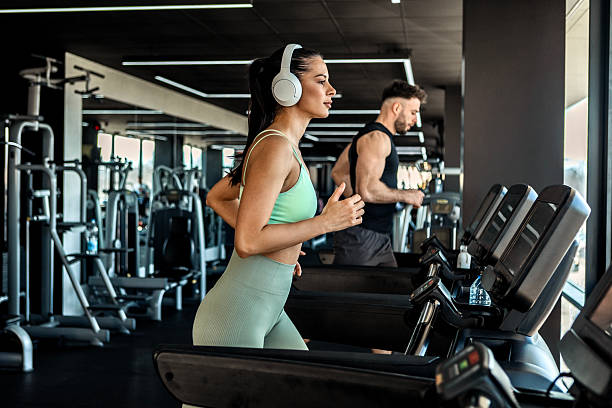 istock Couple Enjoying a Treadmill Workout for a Healthy Lifestyle 2207511032