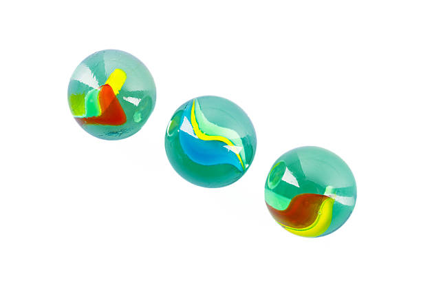 istock Colored glass marbles ball on white background 2207512822