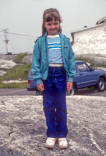 istock Lunenburg - Girls Standing on Rock - 1985 2207513929