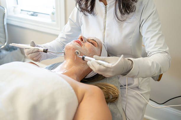 Dermatologist performing a skin treatment in a patient