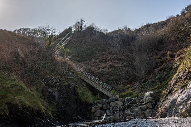 istock Steps down to Polstreath Beach, Mevagissey, St Austell, Cornwall 2207514947