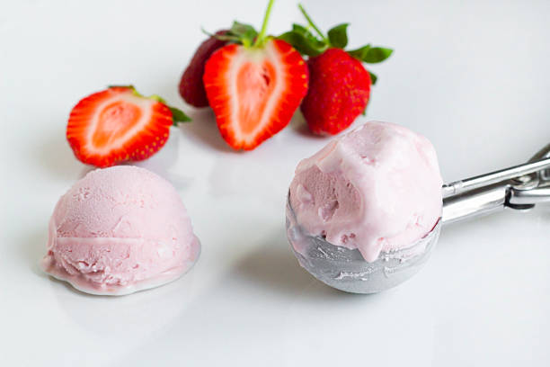 istock Strawberry ice cream with scoop 2207515914
