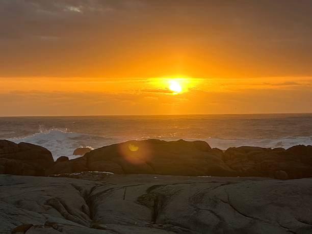istock Golden sunset over the ocean 2207520150