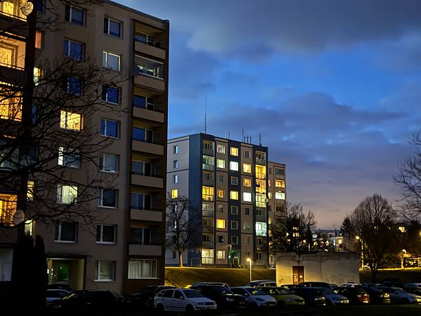 istock Residential Buildings at Dusk with Illuminated Windows 2207524785