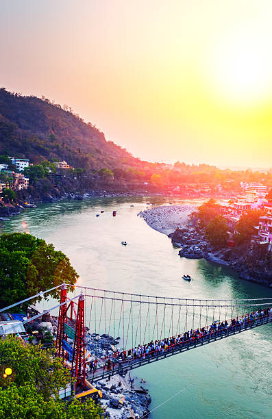 istock laxman jhula bridge in Rishikesh during sunset India 2207526624