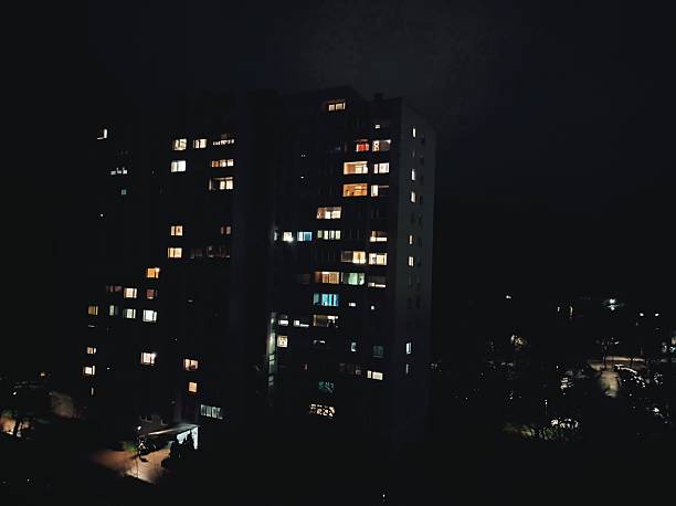 istock Building in the night, lights still turned on 2207532124