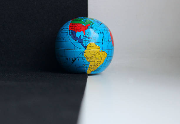 istock Earth Model on Background Divided with Black and White Colors 2207540230
