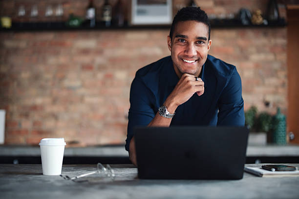 istock Smiling Professional Working Remotely in a Cozy and Stylish Environment 2207541643