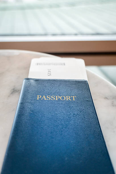 istock Passport with boarding pass in airport 2207541689
