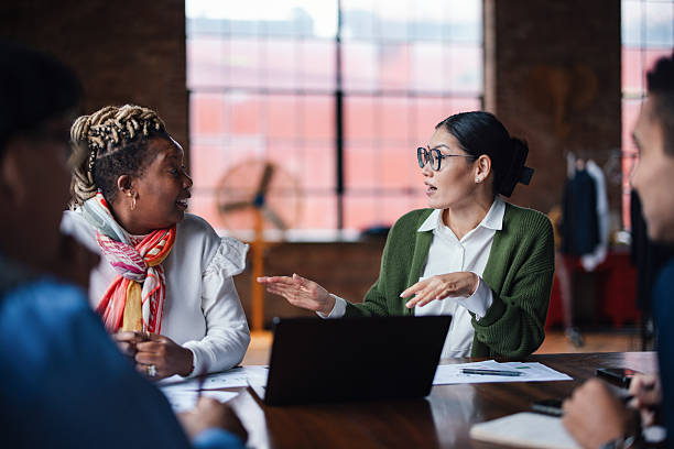 istock Professional Team Collaborating During a Business Meeting in Office Space 2207541716