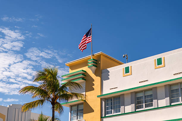 istock Ocean drive. Miami Beach in Ocean Drive Florida. Art Deco building architecture. Architectural building. Art deco. Architectural district Art Deco. Modern building of Miami beach with USA flag 2207549164