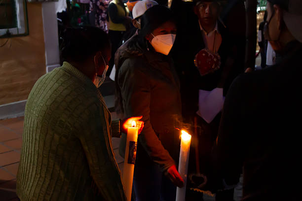 Burning Candles in the dark, in the Church.