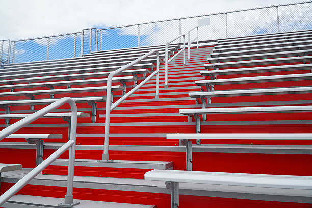 istock rows of seats in college stadium 2207552137