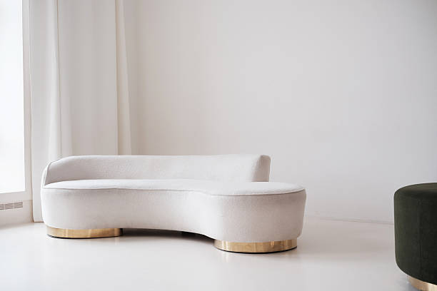 istock White Curved Sofa in Modern Living Space 2207557994