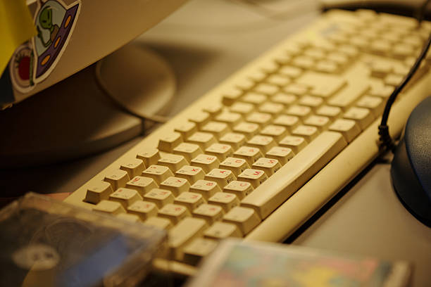 istock Close-Up Showing Vintage Computer Keyboard on Desk 2207563535