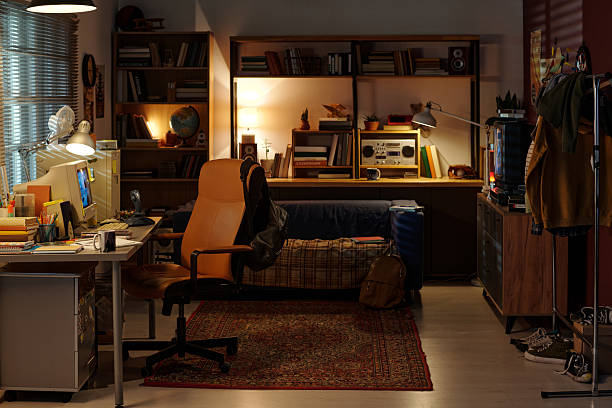 istock Cozy Home Office with Shelving and Desk Lamp 2207563582