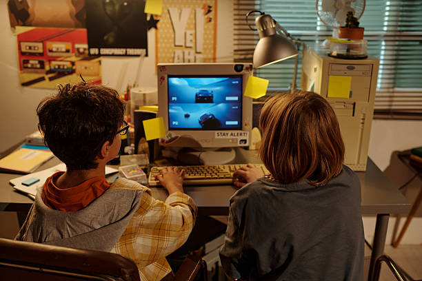 istock Engaging in Retro Gaming on Old Computer at Home 2207563586