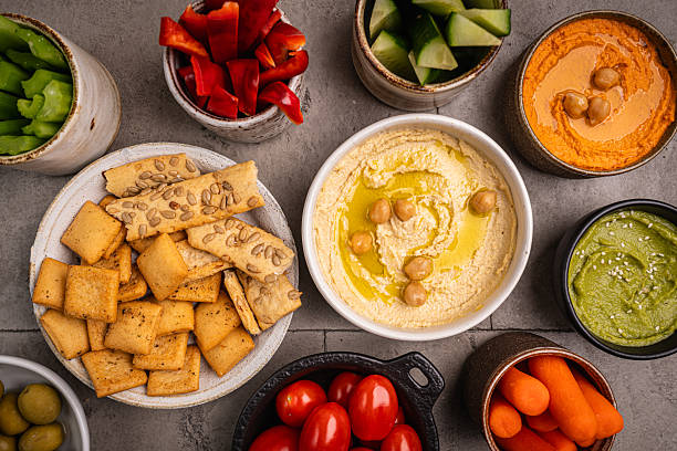 istock Various hummus dips, healthy and vegan snack 2207563729
