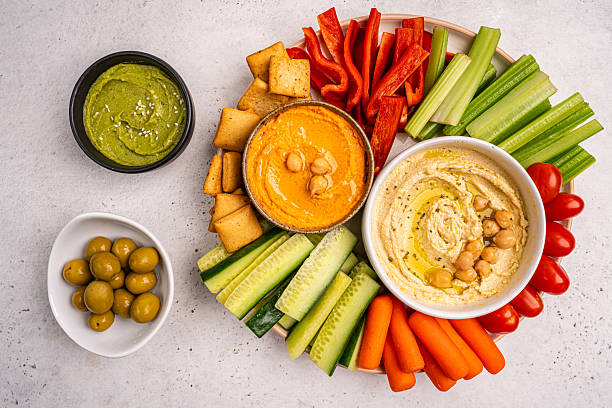 istock Various hummus dips, healthy and vegan snack 2207563746