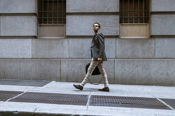 istock Businessman Walking in the Morning 2207564674