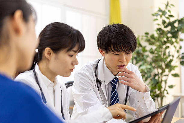 istock Healthcare worker having meeting in doctor’s office 2207565016