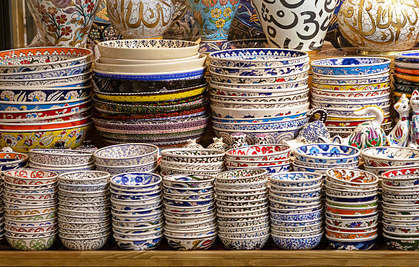 istock Ornate ceramic bowls sold on market stall 2207568129