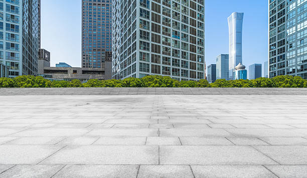 istock Empty brick floor with city skyline background. 2207572263