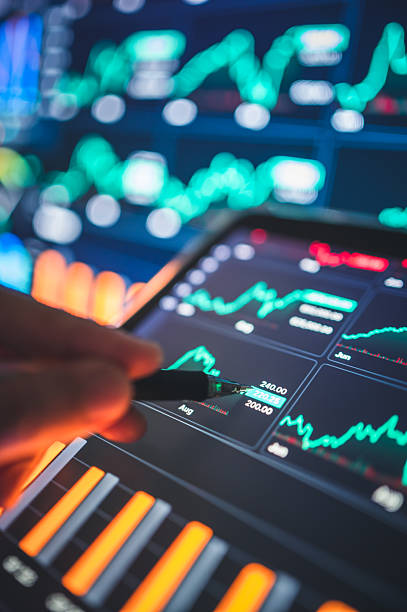 istock Businessperson interact with AI technology on multiple devices analyzing gold & silver trading through digital platforms 2207572898