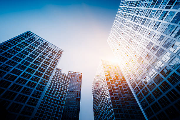 istock Low angle view of modern metallic skyscrapers. 2207573039