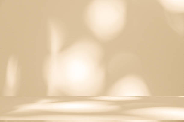 istock Studio style background wall decoration presentation uses white and beige tones. with shadows cast from a nearby window, concept creating a decorative 2207573280
