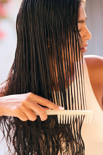 istock Hair Combing Routine With Long Wet Hair for Smooth Styling 2207575589