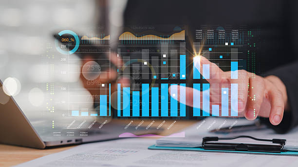 istock Analyzing Data Insights, Business professional analyzes digital graphs on laptop to gain insights into performance metrics, importance of data-driven decision-making 2207577622