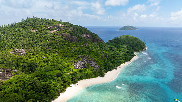 istock A tropical island with a beach. Seychelles. 2207577810