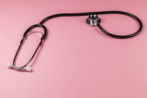 istock Stethoscope on a pink background for healthcare display 2207584264