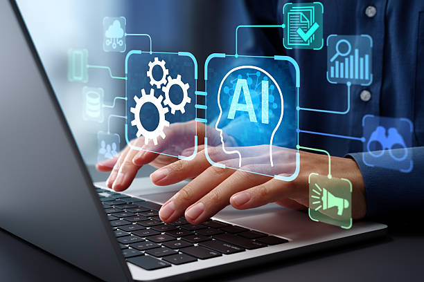 AI agent and intelligent automation IA technology. Business process automation BPA system. Businessman using laptop computer to give instructions to AI at desk in office.